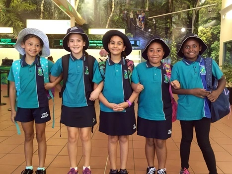 Group of school children linked arms in Skyrail foyer