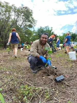Skyrail Ranger at Tropical Tree day with seedlings